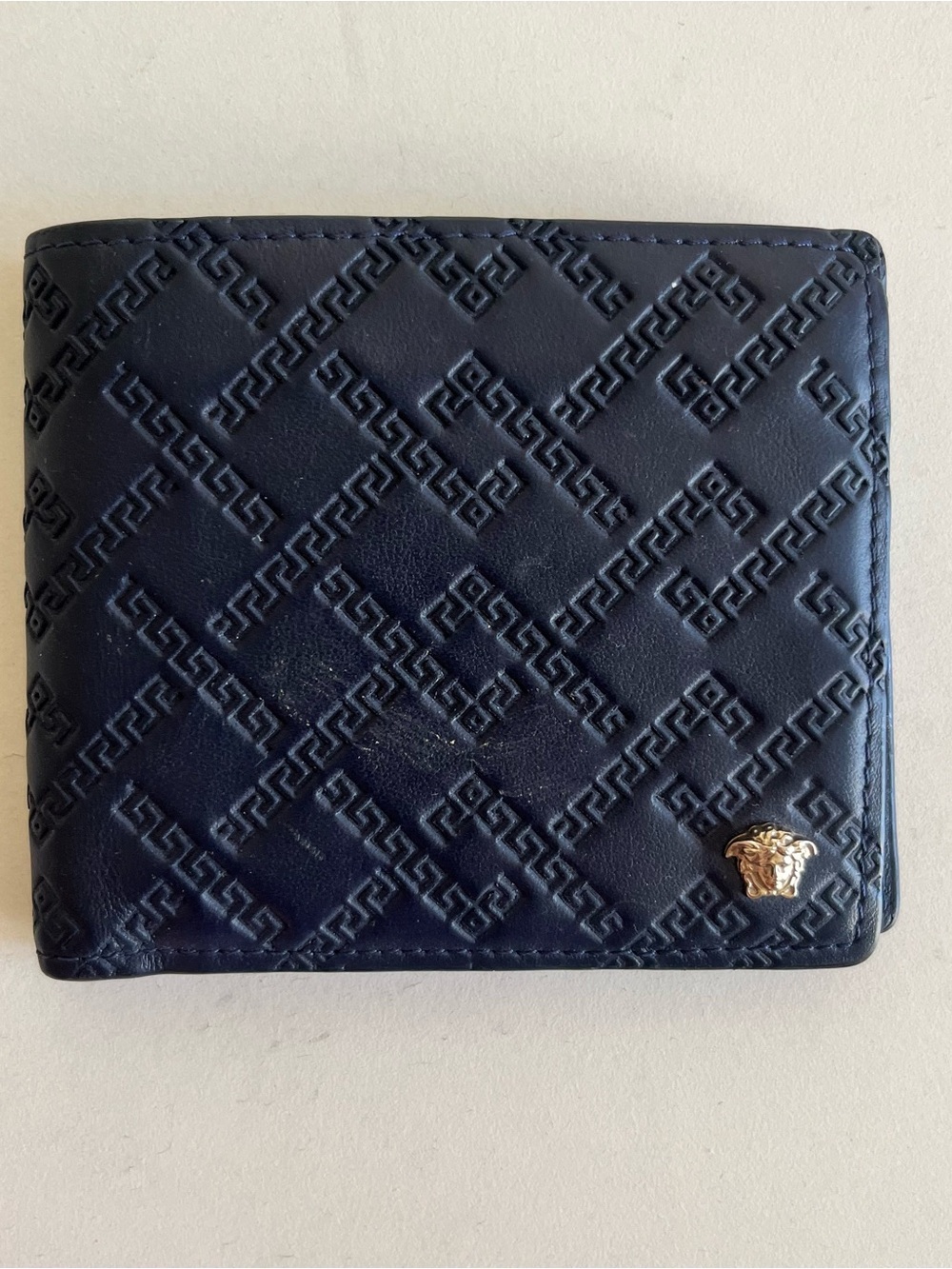 Versace Navy Embossed Leather Bi-Fold Wallet with Gold Medusa Accent